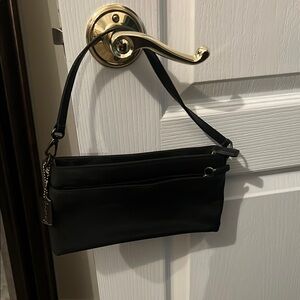 Coach Black Clutch with Leather Material and Zipper Closure
